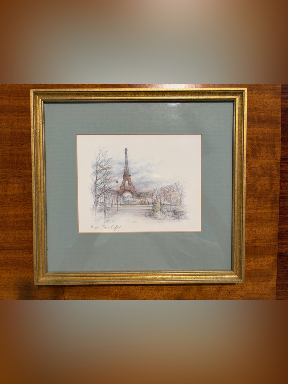 Framed Eiffel Tower Watercolor Print in Light Blue Mat and Gold Frame